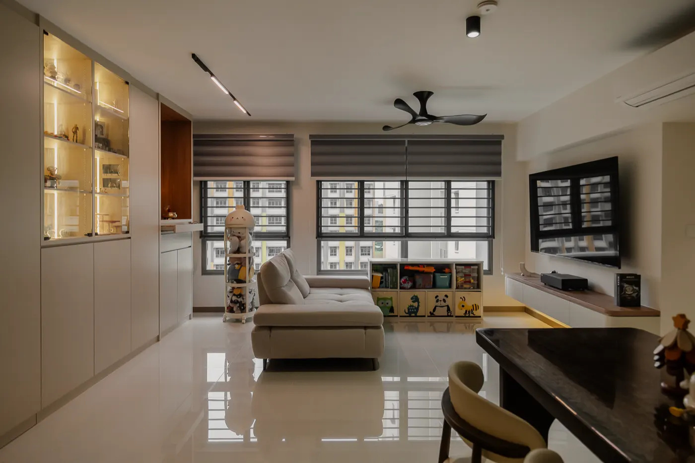Living room with full-height display carpentry, 325A Tengah Garden Walk